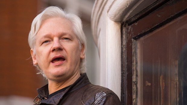 The party filed a multimillion-dollar federal lawsuit and it is going for big targets: the Donald Trump campaign officials, the Russian government as well as WikiLeaks and Australian Julian Assange. (PA)