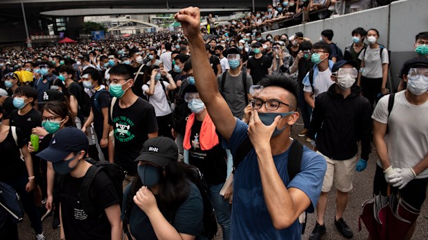 A protester chants slogans against the Chief Executive of Hong Kong Carrie Lam during the demonstration. Thousands of protesters occupied the roads near the Legislative Council Complex in Hong Kong to demand to government to withdraw extradition bill.