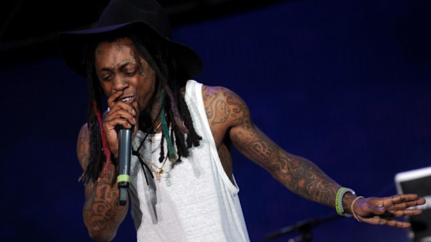 Rapper Lil Wayne has reportedly been hospitalised after having seizures. (AFP) 