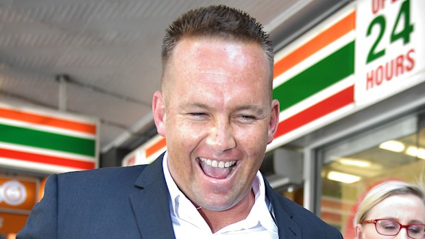 Matthew Scown laughs after leaving court.