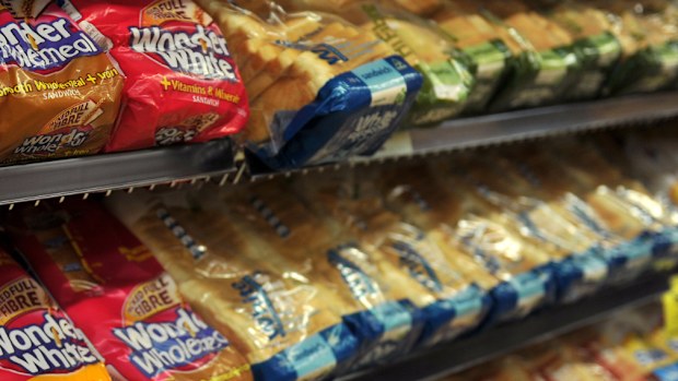 Coles and Woolworths are battling over bread prices. (AAP)