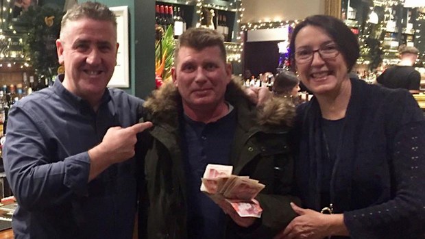 The owners of The Alexandra pub with Mariusz. (Facebook)