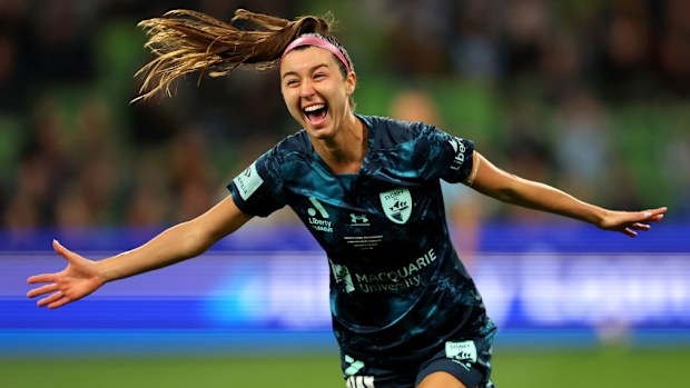 Shea Conn\u00adors of Sydney FC celebrates scoring.