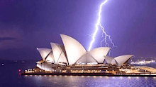 New South Wales was battered last night by an unseasonal storm that unleashed 100,000 lightning strikes across the state.