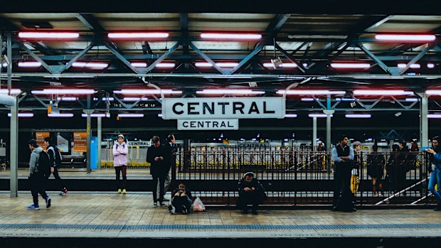 A railway platfrom at Sydney's Central Station at night
