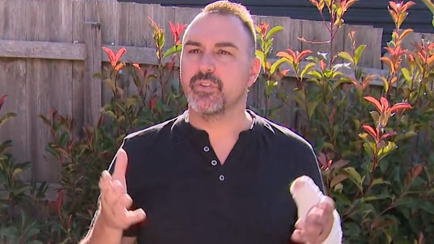 A Mooroolbark father has told of his terror as a young man tried to kick down his front door, while hurling abuse at his family.