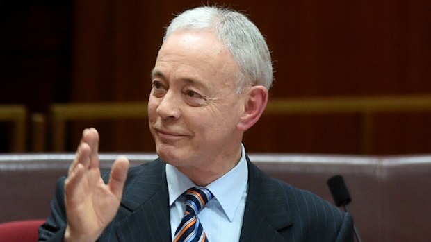 Family First senator Bob Day delivers his maiden speech in the Senate chamber at Parliament House in Canberra. (AAP Image/Lukas Coch)