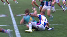 Dane Gagai tackles Titans gun AJ Brimson.