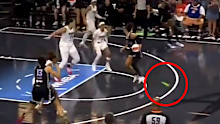 An adult device thrown onto the court disrupts play late in the fourth quarter of the Atlanta Dream's game against the Golden State Valkyries.