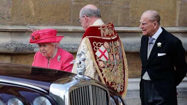 Queen Elizabeth II and Prince Philip leave the chapel after the wedding of Lady Gabriella Windsor.