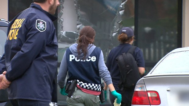 Police in Melbourne at a home of one of the accused.