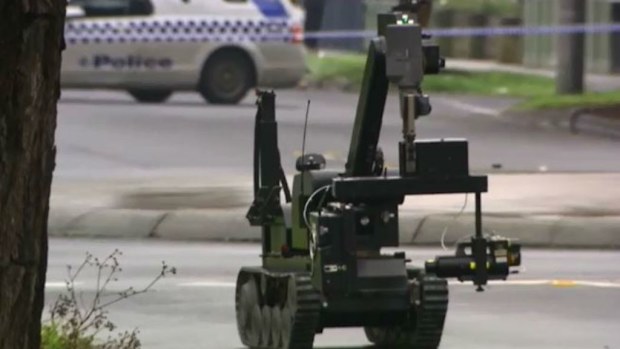 The police bomb squad robot was used to to investigate the device. (9NEWS)