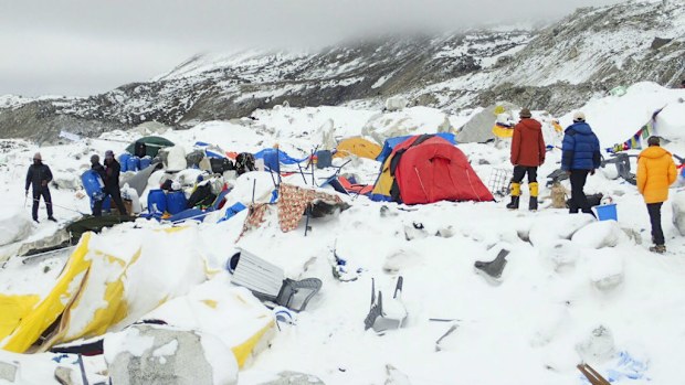 Dozens of tents lie damaged after an avalanche plowed through Mount Everest base camp. (AAP)