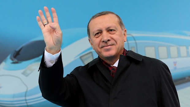 Turkish President Recep Tayyip Erdogan greets the crowd during the opening ceremony of high speed train station in Ankara, Turkey on October 29, 2016. (AFP)