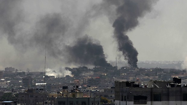 Smoke rises from the sites of Israeli air strikes on Rafah, in Gaza City. At least 40 Palestinians were killed. (Getty Images)