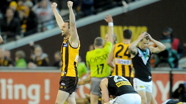 Hawthorn's Matt Suckling celebrates reaching the 2014 grand final. The defender missed the Hawks' 2013 flag with injury. (AAP)