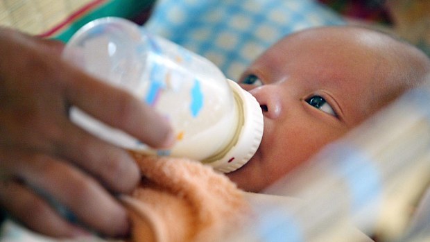 Inter-country adoption rates have dropped according to a new report. (AAP)