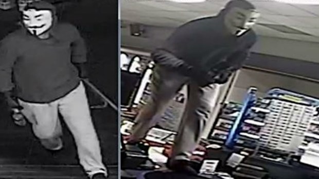 CCTV footage of the man in the 'V for Vendetta' mask. (Vic Police) 