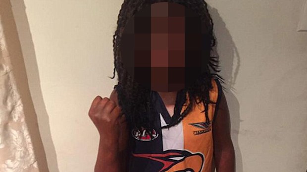 A Perth mother has come under fire after painting her son's face black for a Book Week parade. (Facebook)