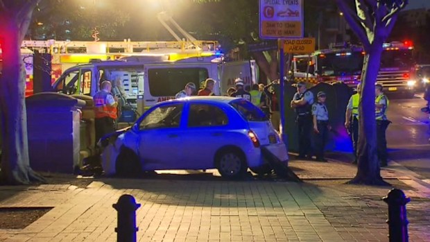The car mounted the footpath in Pyrmont before hitting the two men. (9NEWS)