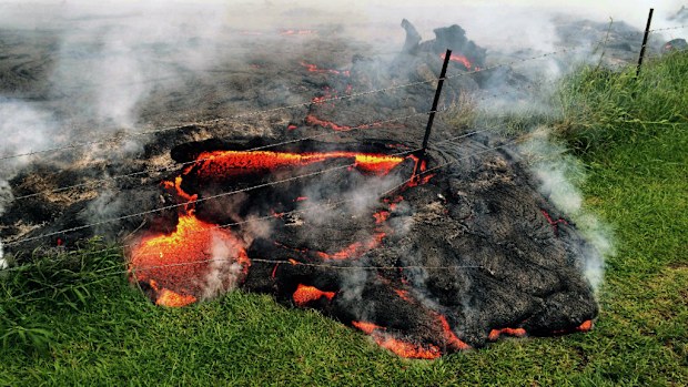 A lava flow is threatening homes in a Hawaiian village. (AAP)