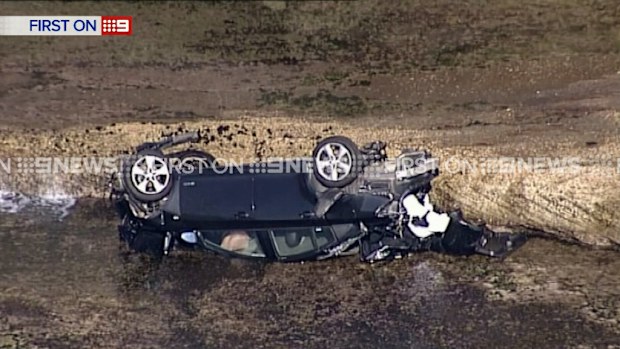 The sole occupant of the car was found near the wreckage of the vehicle. (9NEWS)