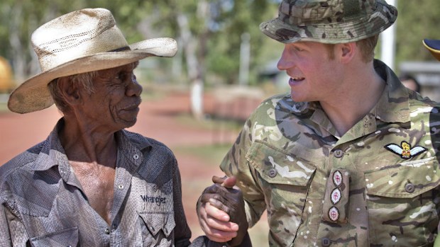 Prince Harry shakes hands with local Russel Smith in Kununurra. (AAP)