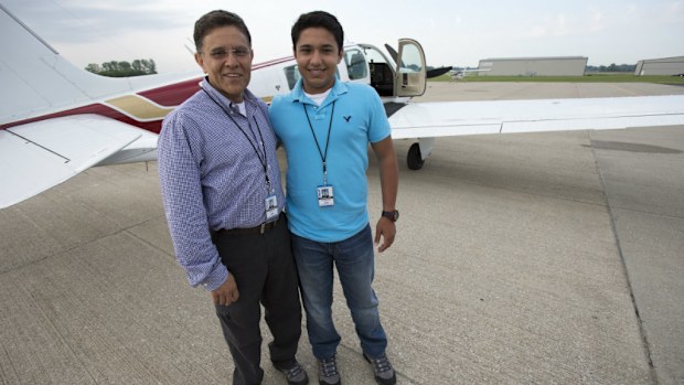 Haris Suleman, 17 (right), and his father Babar have died in a plane crash during an attempted round-the-world flight for charity. (AAP)