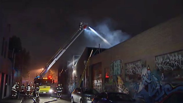 Fire tore through a Fitzroy factory in the process of being converted into apartments. (9NEWS)