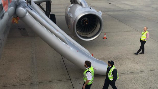 The slide was deployed on the tarmac at Tullamarine Airport this morning. (Twitter/@flameoffirefoto)