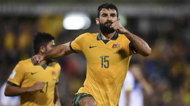 Socceroos captain Mile Jedinak celebrates a goal. (AAP)