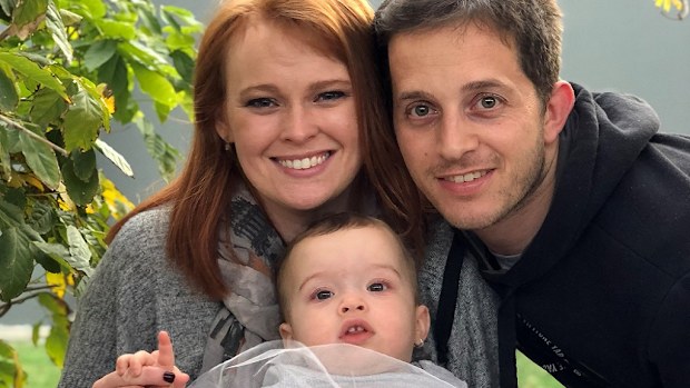 Chloe Kennedy spinal injury with partner and daughter