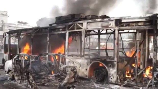 A burning bus in the Ukrainian rebel stronghold of Donetsk after a period of heavy shelling. 