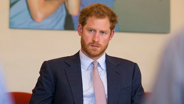 Britain's Prince Harry takes part in a round table discussion with HIV doctors at King's College Hospital in south London.