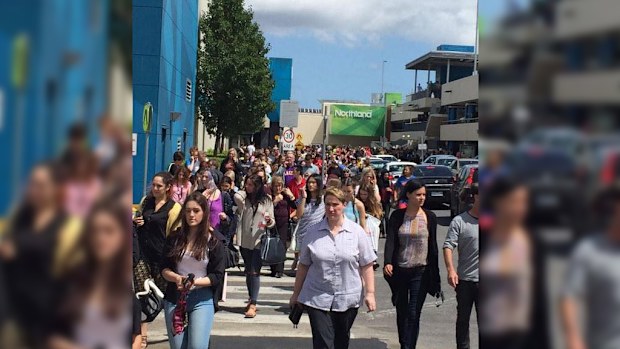 Staff and customers have been forced to flee Northland Shopping Centre in Preston. (Twitter, @Bindi_James)