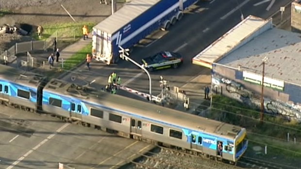 A train has collided with a truck in Melbourne's south-east. (9NEWS)