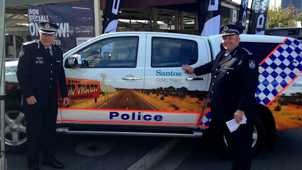 Assistant Commissioner Tony Wright with another officer launching the vehicle. (Queensland Police Service)