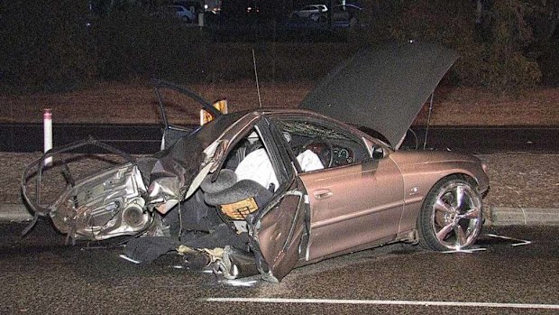 The car was found split in half after it crashed into a tree. (9NEWS)