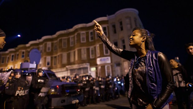 Protesters defy police in Baltimore earlier this week. (AFP)