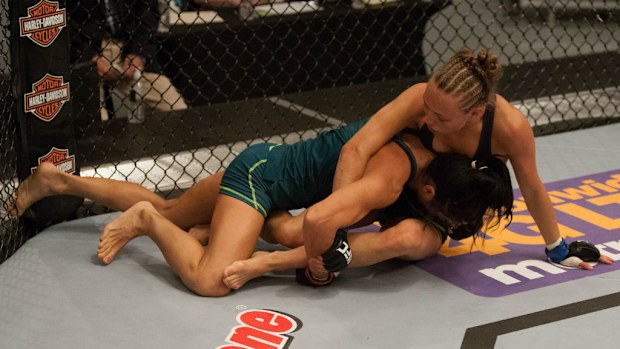 Rose Namajunas takes down team Pettis fighter Randa Markos. (Getty Images)