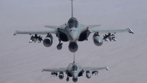 Two French 'Rafale' fighter jets during a mission at an unspecified location over Iraq. (AAP)