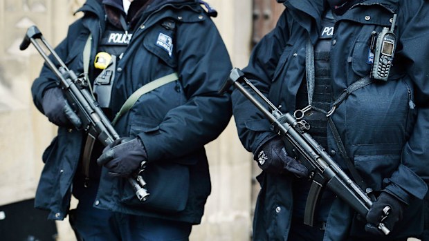Police in London armed with sub-machine guns. (AAP)