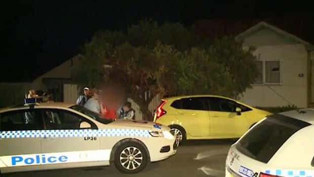 Police make arrests at the scene. (9NEWS)