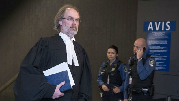Lead prosecutor, Louis Bouthillier, enters the courthouse where Luka Rocco Magnotta appeared for an earlier hearing. (Getty)