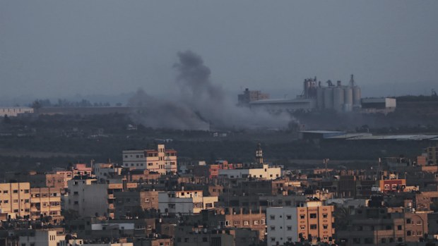 Smoke rises after an Israeli missile strike in Gaza City, Saturday, July 19, 2014. (AAP)