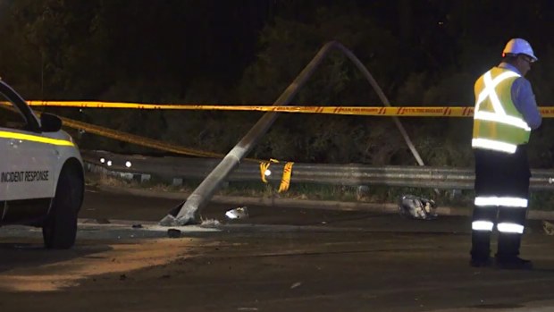 Two police officers were involved in a pursuit when their car crashed into a light pole in south-west Sydney. (9NEWS)
