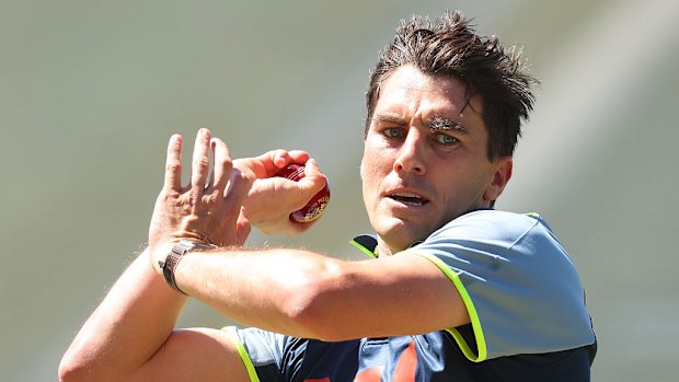 Pat Cummins bowls in the nets.