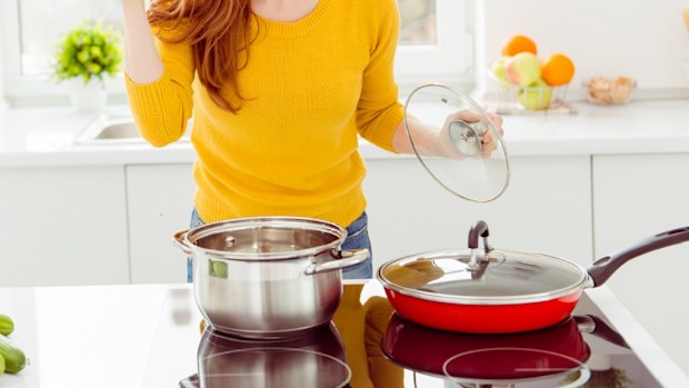 Woman cooking in kitchen