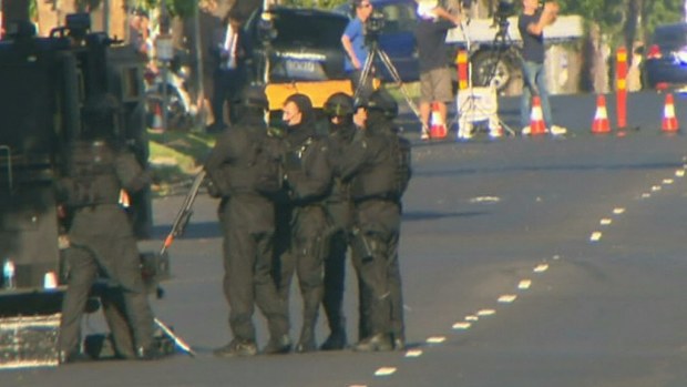 The alleged killer was in a nine-hour stand off with police after the attack. (9NEWS)