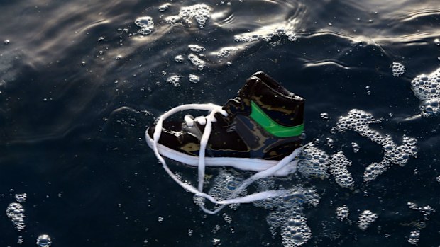 A shoe belonging to one of the people on board the rickety boat that sunk off the coast of Libya. (Getty Images)